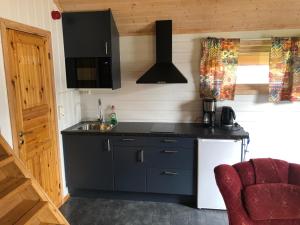 Küche/Küchenzeile in der Unterkunft Elvegård Fjordcamp