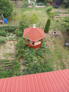 an overhead view of a house with a red roof at Bujdy Apartman in Szerencs