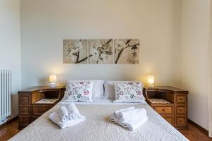 A bed or beds in a room at Attico Panoramico
