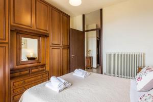 A bed or beds in a room at Attico Panoramico