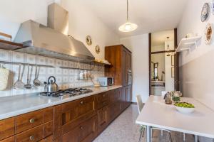 A kitchen or kitchenette at Attico Panoramico