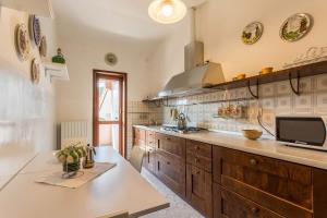 A kitchen or kitchenette at Attico Panoramico