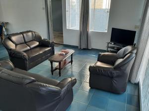 Posezení v ubytování Villa La Famille Dodo