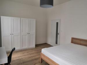 Postel nebo postele na pokoji v ubytování Znojmo apartmány
