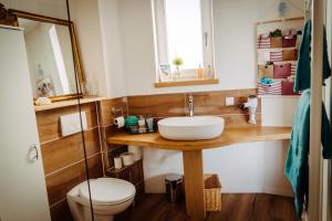 Koupelna v ubytování Das Appartement