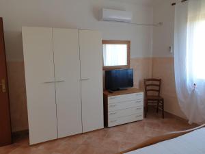 TV in/ali zabaviščno središče v nastanitvi Agriturismo Baratz