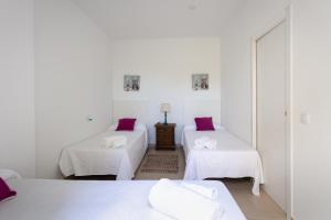 Postel nebo postele na pokoji v ubytování Apartamentos Homing Puerto Sherry