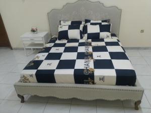 Säng eller sängar i ett rum på Residence villa 106