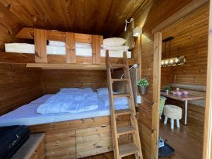 Postel nebo postele na pokoji v ubytování HYGGE Strand Camping
