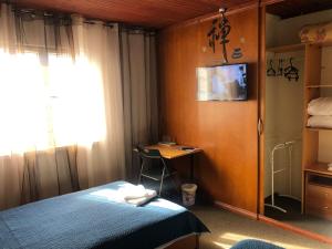 TV a/nebo společenská místnost v ubytování Sandra Hause