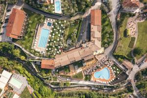 an overhead view of a campus with buildings and a road at Hotel Caravel in Limone sul Garda