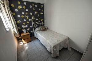 Postel nebo postele na pokoji v ubytování Edificio Prieto VIV 8
