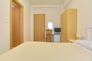 Posteľ alebo postele v izbe v ubytovaní International Hotel