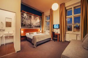 Säng eller sängar i ett rum på Metropolitan Old Town Hotel - Czech Leading Hotels