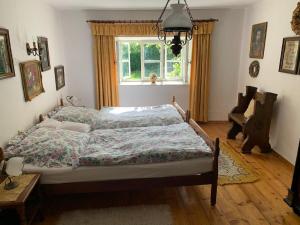 Ένα ή περισσότερα κρεβάτια σε δωμάτιο στο Ferienhaus Rötzer Maria