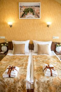 Postel nebo postele na pokoji v ubytování Hotel&SPA Pysanka, Готель Писанка, 3 сауни та джакузі - індивідуальний відпочинок у СПА