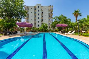 The swimming pool at or close to Melissas Suites Lara