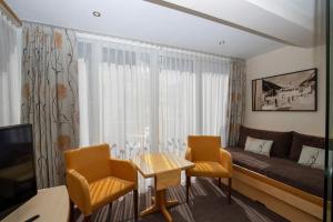 A television and/or entertainment centre at Hotel Charly