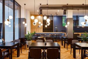 Reštaurácia alebo iné gastronomické zariadenie v ubytovaní ШПИЦІ Hotel & SPA