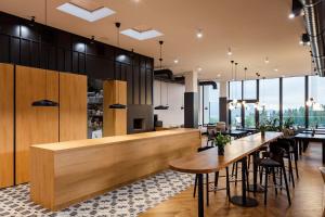 Reštaurácia alebo iné gastronomické zariadenie v ubytovaní ШПИЦІ Hotel & SPA