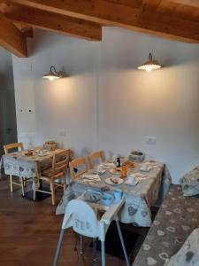 Reštaurácia alebo iné gastronomické zariadenie v ubytovaní B&B alla Spiazzőla