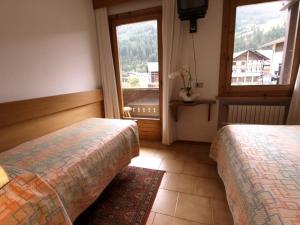 Postel nebo postele na pokoji v ubytování Hotel Gardenia + 20 fotografií