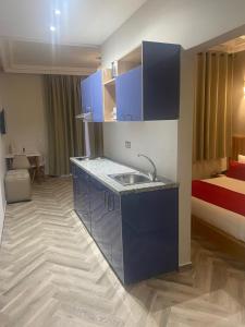 Postel nebo postele na pokoji v ubytování Golden Beach Appart'hotel