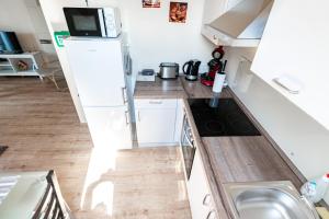 Kuchyň nebo kuchyňský kout v ubytování Ferienwohnung Bad Camberg - Apartment Goldener Grund