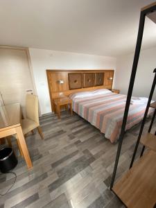 Postel nebo postele na pokoji v ubytování B&B Torre Pozzillo