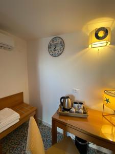 Postel nebo postele na pokoji v ubytování B&B Torre Pozzillo