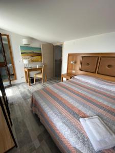 Postel nebo postele na pokoji v ubytování B&B Torre Pozzillo