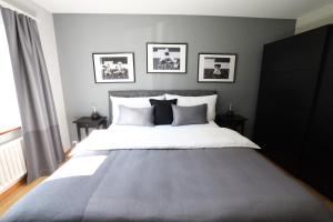 Postel nebo postele na pokoji v ubytování Armotti Apartments Friedheim