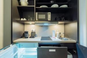 Kuchyň nebo kuchyňský kout v ubytování Nena Apartments - Kreuzberg 61