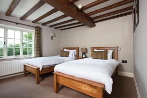 Broom Hall Inn客房内的一张或多张床位