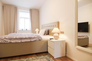 Postel nebo postele na pokoji v ubytování Prague Expat House II
