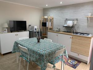 A kitchen or kitchenette at Case vacanza Sole e Luna