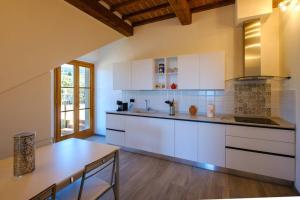 Kuchyň nebo kuchyňský kout v ubytování A Casa di Patrizia