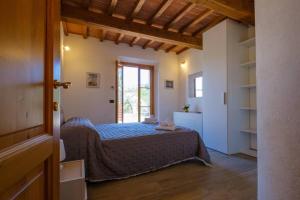 Postel nebo postele na pokoji v ubytování A Casa di Patrizia + 36 fotografií