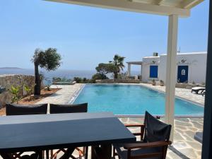 a view of a swimming pool from a villa at Windmill House Antiparos in Soros