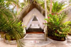 Um jardim no exterior de Bohemia Beach Tayrona
