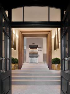 a view of the lobby of a building with stairs at B60 Hotel in Moscow