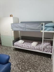 Krevet ili kreveti na kat u jedinici u objektu Dimora Kailia - CIS BR07400391000019077