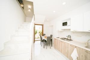 Η κουζίνα ή μικρή κουζίνα στο La Piazzetta Boutique Apartments