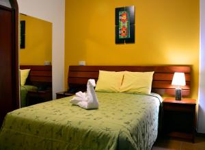Postel nebo postele na pokoji v ubytování Hotel Sol del Sur