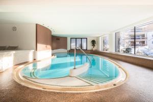 Bazén v ubytování Appartements Kammerlander nebo v jeho okolí