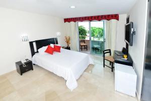 Postel nebo postele na pokoji v ubytování Hotel Suite Continental