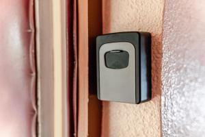 a close up of a door knob on a door at Freshly renovated family apartment in Kuressaare