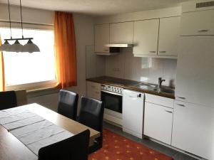 A kitchen or kitchenette at Haus Resi