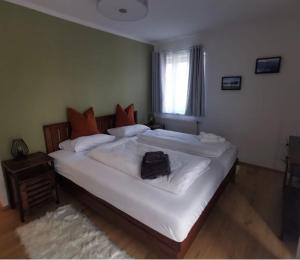 A bed or beds in a room at Appartamento Giovanna Rosegg