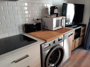 Kuchyň nebo kuchyňský kout v ubytování Apartamento Centre Blanes
